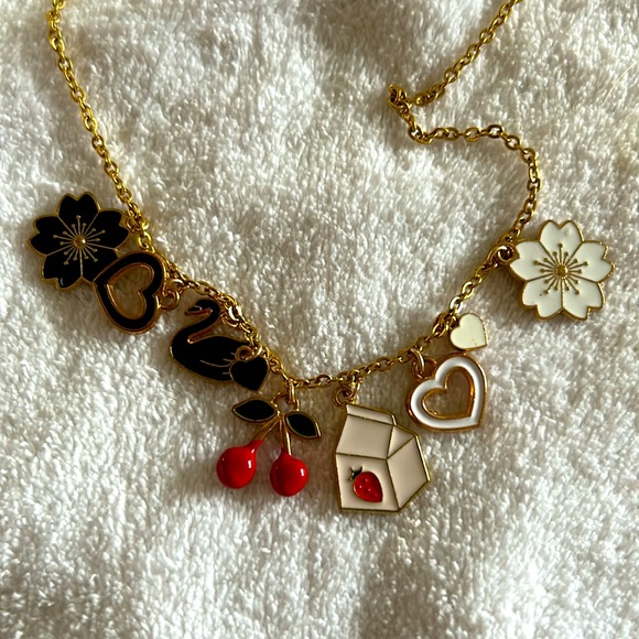 Gold charm necklace (9 charms) - 17” in length - Picture 2 of 2